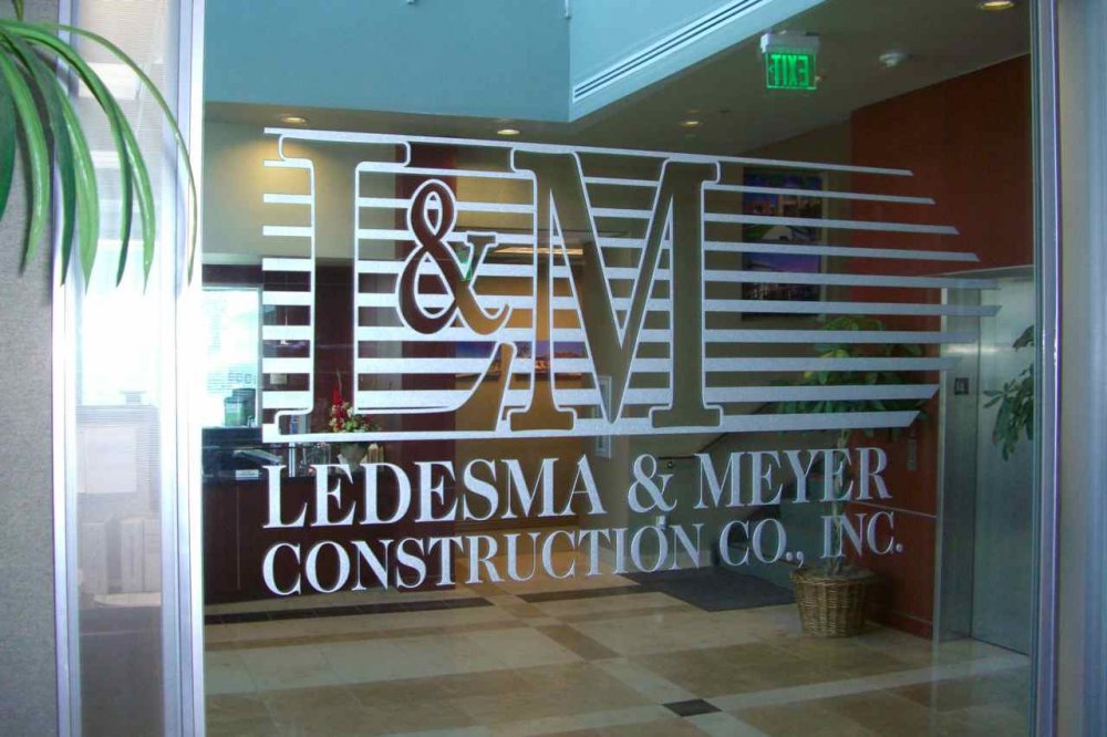 glass sign ledesma meyer logo