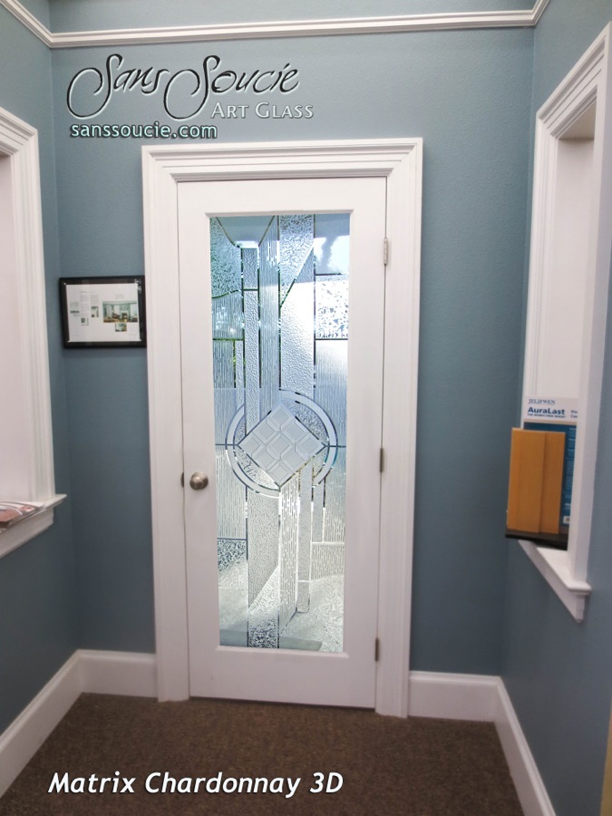 Decorative etched glass front door with geometric pattern