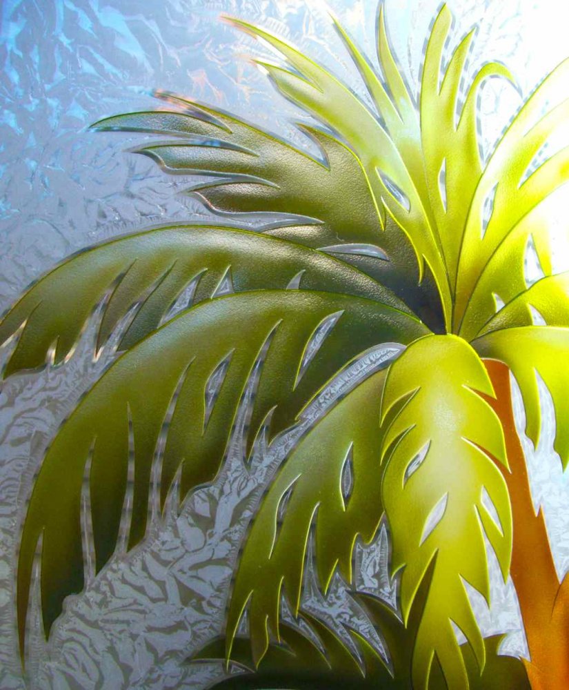 Close-up of vibrant carved palm glass design, an eye-catching choice for a black entry door with glass that brings warmth, texture, and light to the entryway.