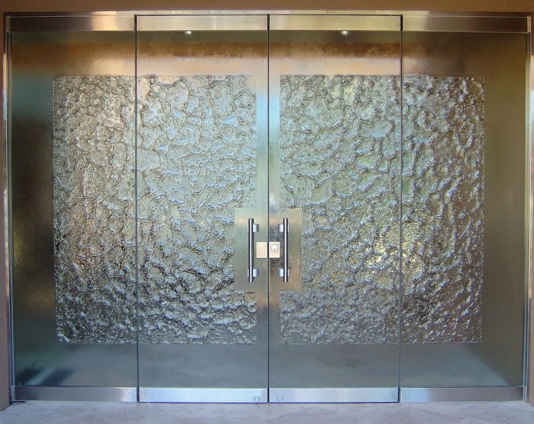 Custom Frameless Glass Doors with frosted designs for businesses.