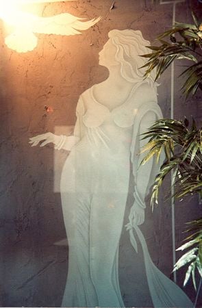 Partition featuring a Frosted Glass Portraitures Design Sandblast Etched Glass Lady and the Falcon Design by Sans Soucie