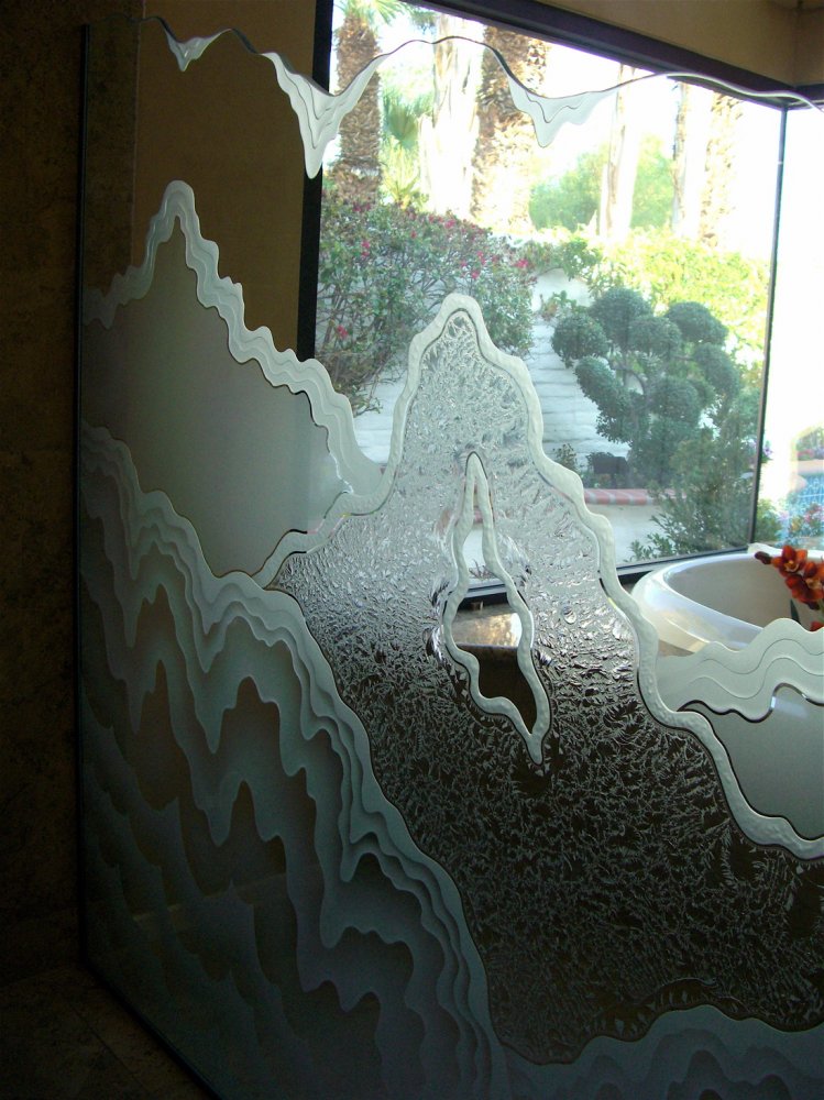 Rugged Retreat etched glass panel features a landscape carved with deep texture and layered shading