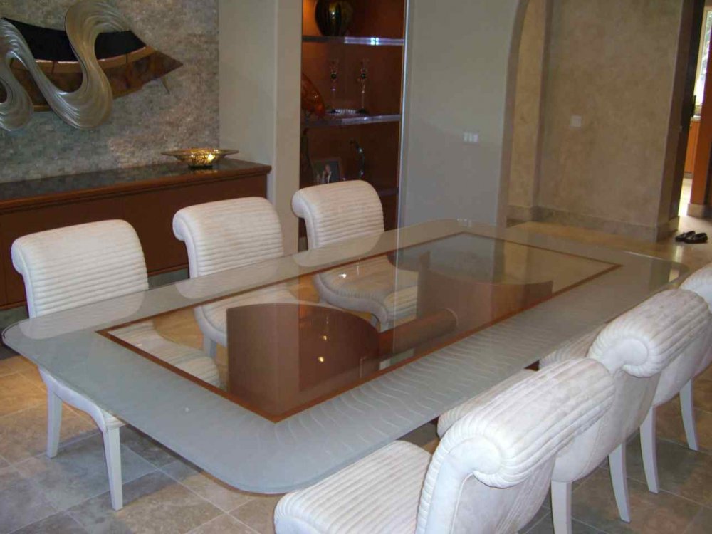 Premium custom cut glass table top.