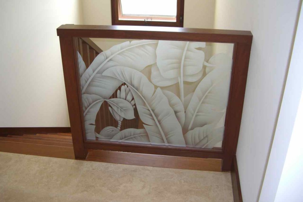Decorative guard panel along staircase