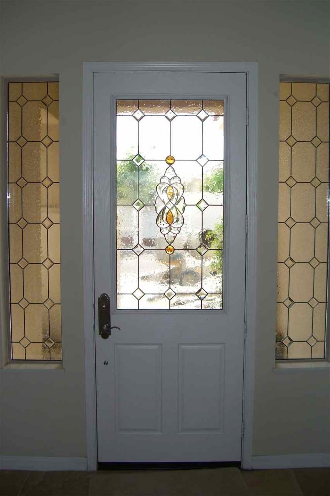 Beveled glass front door and beveled sidelight windows