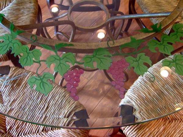 Glass Dining Table featuring a Frosted Glass Grapes & Ivy Design Sandblast Etched Glass Vineyard Grapes Garland Design by Sans Soucie