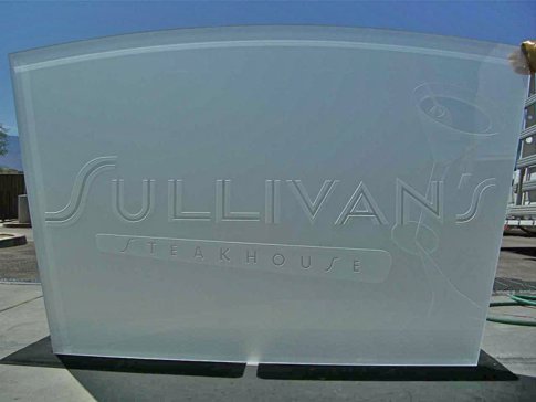 Window with Frosted Glass Logos Sullivans Steakhouse (similar look) Design by Sans Soucie