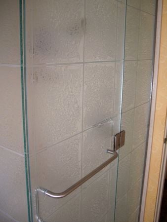 Shower Enclosure featuring a Frosted Glass Patterns Design Sandblast Etched Glass Gluechip Tiles Design by Sans Soucie