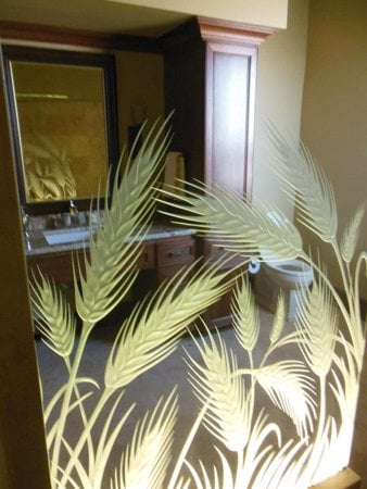 Partition showcasing a Frosted Glass Foliage Design with Sandblast Etched Glass Art by Sans Soucie Wheat  Design