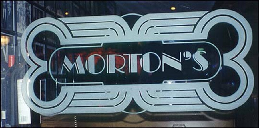 Partition showcasing a Frosted Glass Logos Design with Sandblast Etched Glass Art by Sans Soucie Morton's (similar look) Design