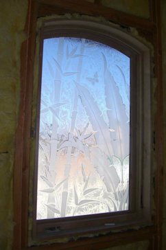 Window with a Frosted Glass Banana Leaves Bamboo Asian Design for Semi-Private by Sans Soucie Art Glass