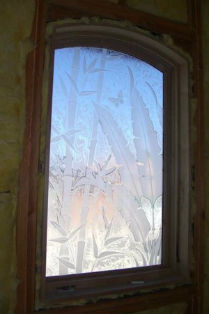 Window with a Frosted Glass Banana Leaves Bamboo Asian Design for Semi-Private by Sans Soucie Art Glass