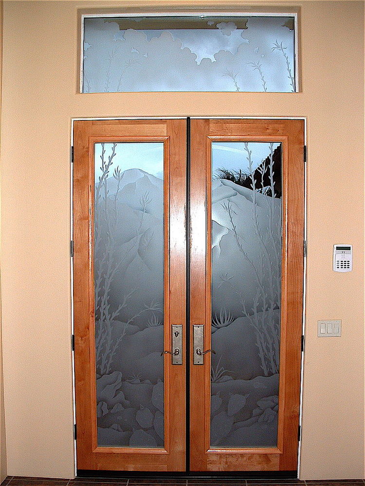 Etched glass front door with detailed desert mountain landscape and pine tree scene, nature-inspired decorative glass front door