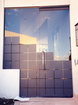 Handcrafted Etched Glass Exterior Glass Door by Sans Soucie Art Glass with Custom Geometric Design Called Squares Creating Semi-Private