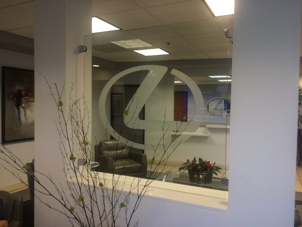 Commercial glass partition wall in corporate office environment