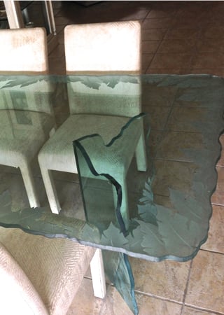 Glass Dining Table featuring a Frosted Glass Tropical Design Sandblast Etched Glass Banana Leaves Edge Design by Sans Soucie