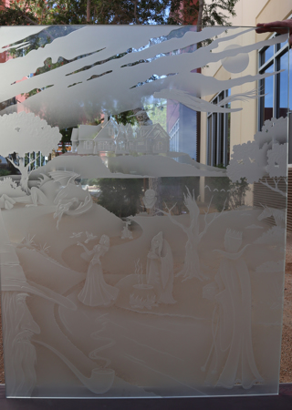 Window showcasing a Frosted Glass Whimsical Design with Sandblast Etched Glass Art by Sans Soucie Fantasy Folklore II Design