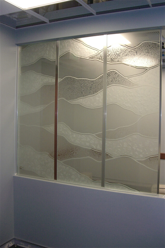 Residential glass divider featuring Abstract Hills