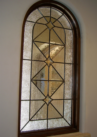 Window showcasing a Frosted Glass Traditional Design with Sandblast Etched Glass Art by Sans Soucie Acute Angles Bubbles Design