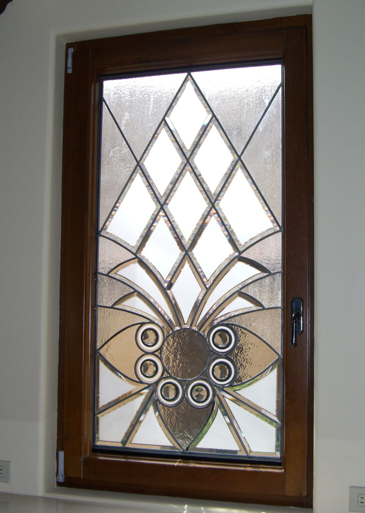 Small frosted glass window ideal for compact bathrooms, combining privacy and soft natural light.