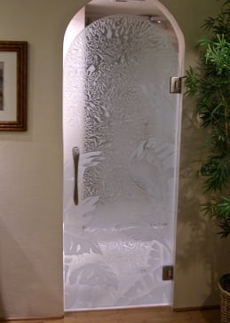 Art Glass Interior Glass Door Featuring Sandblast Frosted Glass by Sans Soucie for Semi-Private with Tropical Banana Leaves II Design