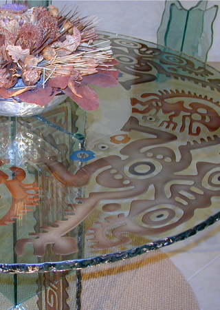 Glass Dining Table with a Frosted Glass Tiki Man Border African Design for Not Private by Sans Soucie Art Glass