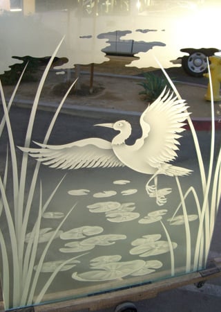 Partition showcasing a Frosted Glass Wildlife Design with Sandblast Etched Glass Art by Sans Soucie Dancing Egret Design