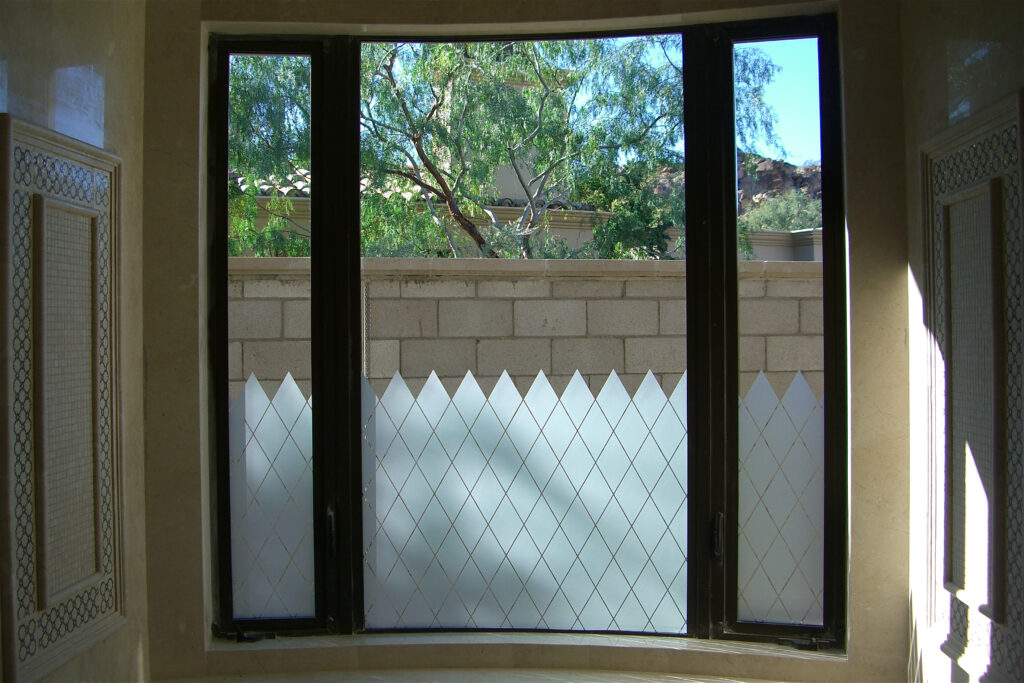 Decorative glass window that is frosted for privacy