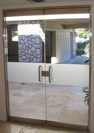 All Glass Front Door showcasing a Frosted Glass Geometric Design with Sandblast Etched Glass Art by Sans Soucie Solid Band Design