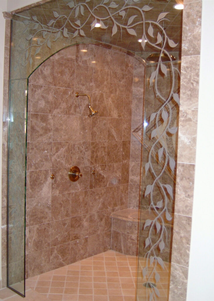 Frameless glass shower enclosure with Elegant Vines design