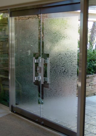 All Glass Front Door showcasing a Frosted Glass Plain Solid Gluechip Overall Design with Sandblast Etched Glass Art by Sans Soucie Plain Gluechip Overall Design