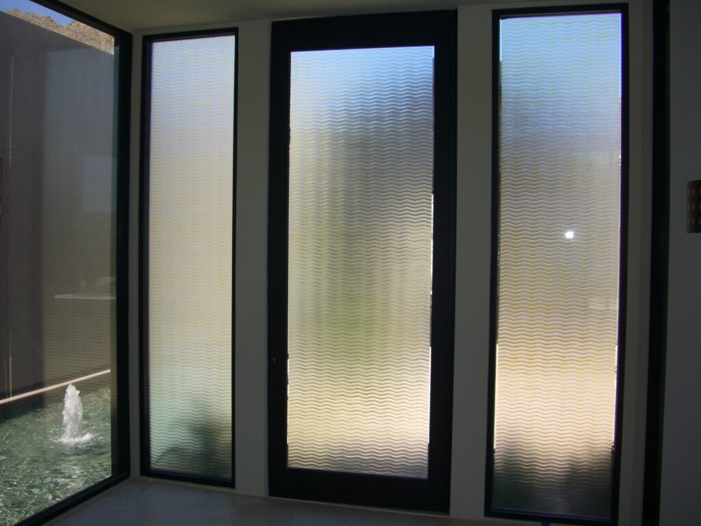 Front door and sidelights with frosted Wave Pattern