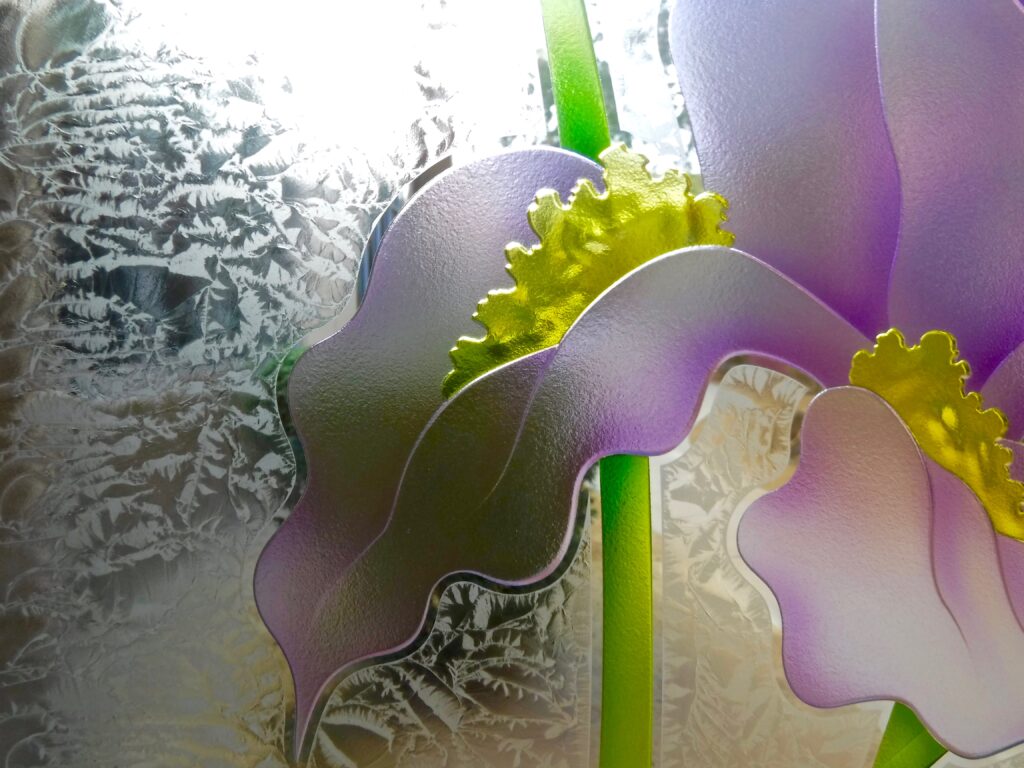 Close-up look of the Iris Hummingbird flower design.