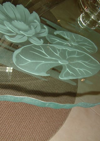 Glass Dining Table featuring a Frosted Glass Floral Design Sandblast Etched Glass Lily Pads & Lotus Design by Sans Soucie