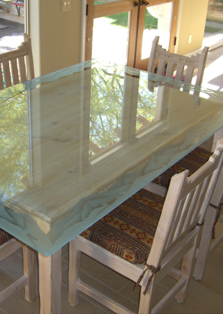 Glass Dining Table featuring a Frosted Glass Desert Design Sandblast Etched Glass Mountains Design by Sans Soucie