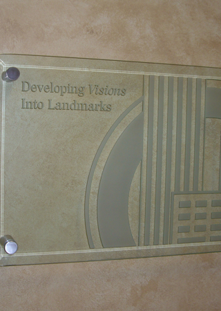 Glass Sign showcasing a Frosted Glass Logos Design with Sandblast Etched Glass Art by Sans Soucie Orr Builders (similar look) Design