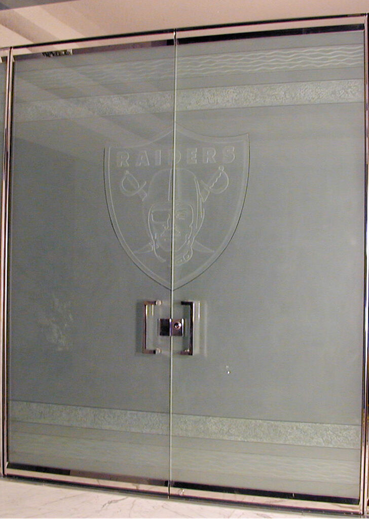 Glass door with custom business branding and logo etching