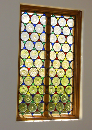 Window showcasing a Frosted Glass Traditional Design with Sandblast Etched Glass Art by Sans Soucie Rondels Design