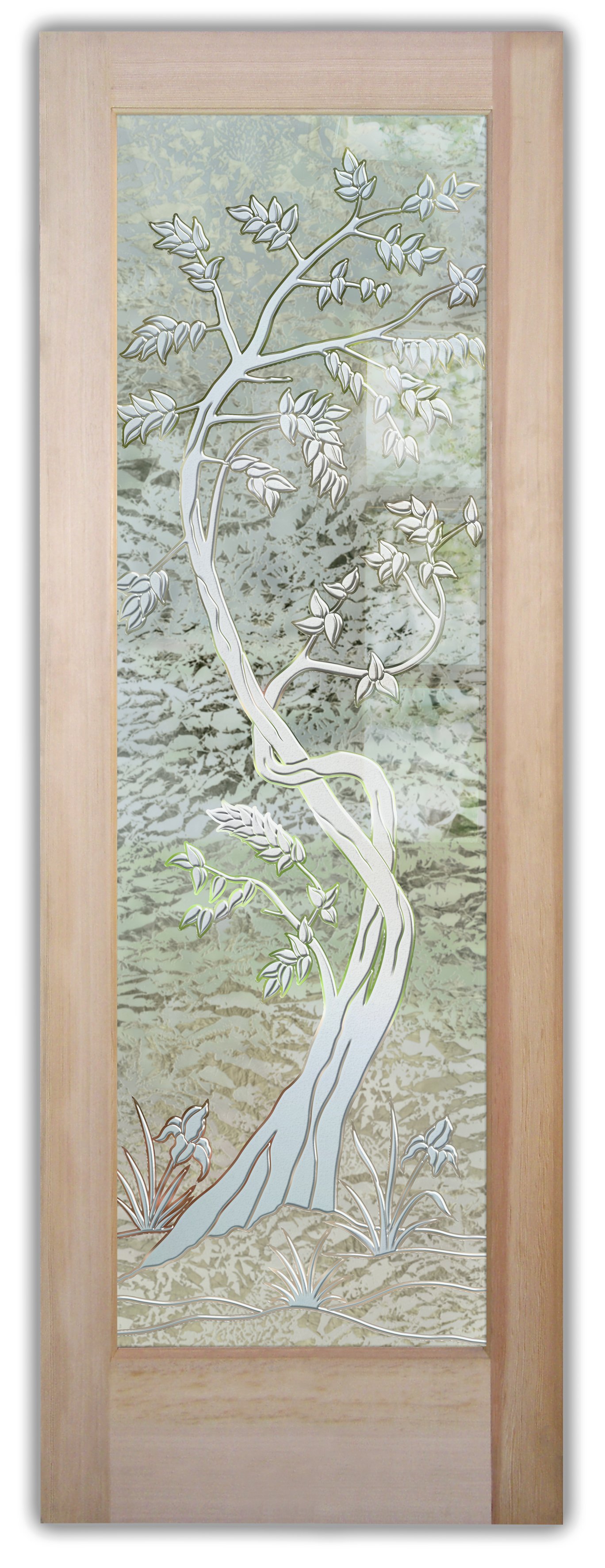 Art glass door with a delicately carved tree design set against a softly textured background.