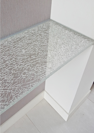 Shelf showcasing a Frosted Glass Shattered Glass Design with Sandblast Etched Glass Art by Sans Soucie Shattered Glass Ultra Clear Design