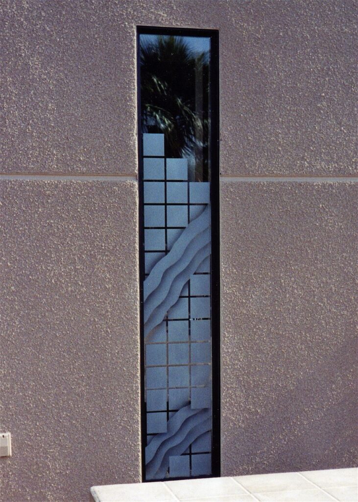 Small vertical frosted glass bathroom window by Sans Soucie.