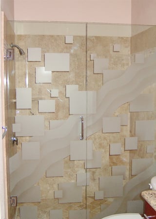Shower Enclosure showcasing a Frosted Glass Geometric Design with Sandblast Etched Glass Art by Sans Soucie Floating Squares & Waves Design