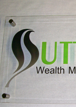 Glass Sign with Frosted Glass Logos Sutter Wealth Management (similar look) Design by Sans Soucie