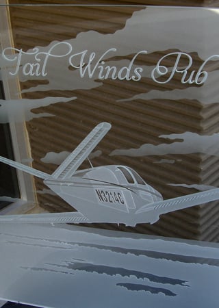 Glass Sign featuring Frosted Glass Design Etched Glass by Sans Soucie Art Glass with Custom Landscapes Design Tail Winds