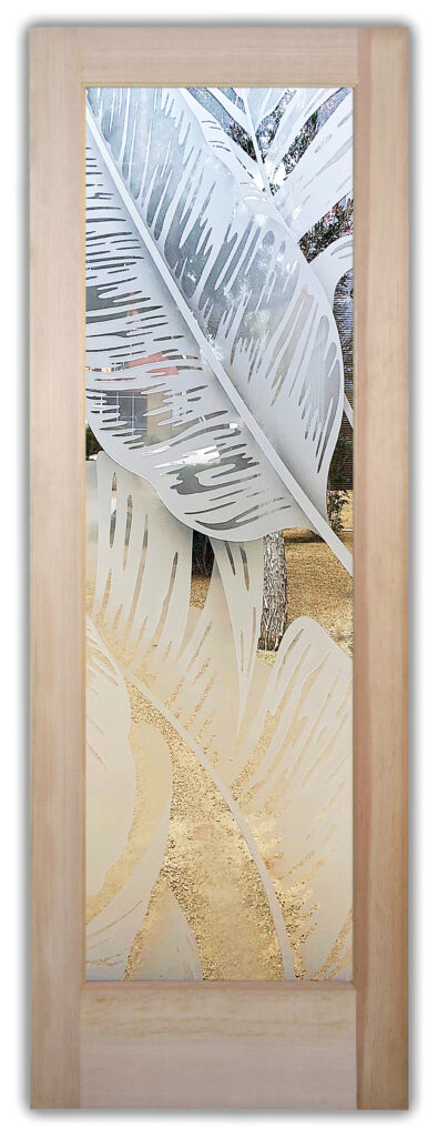 Decorative glass interior door with etched tropical leaf pattern and soft frosted gradient, creating a bright coastal tropical style with added privacy