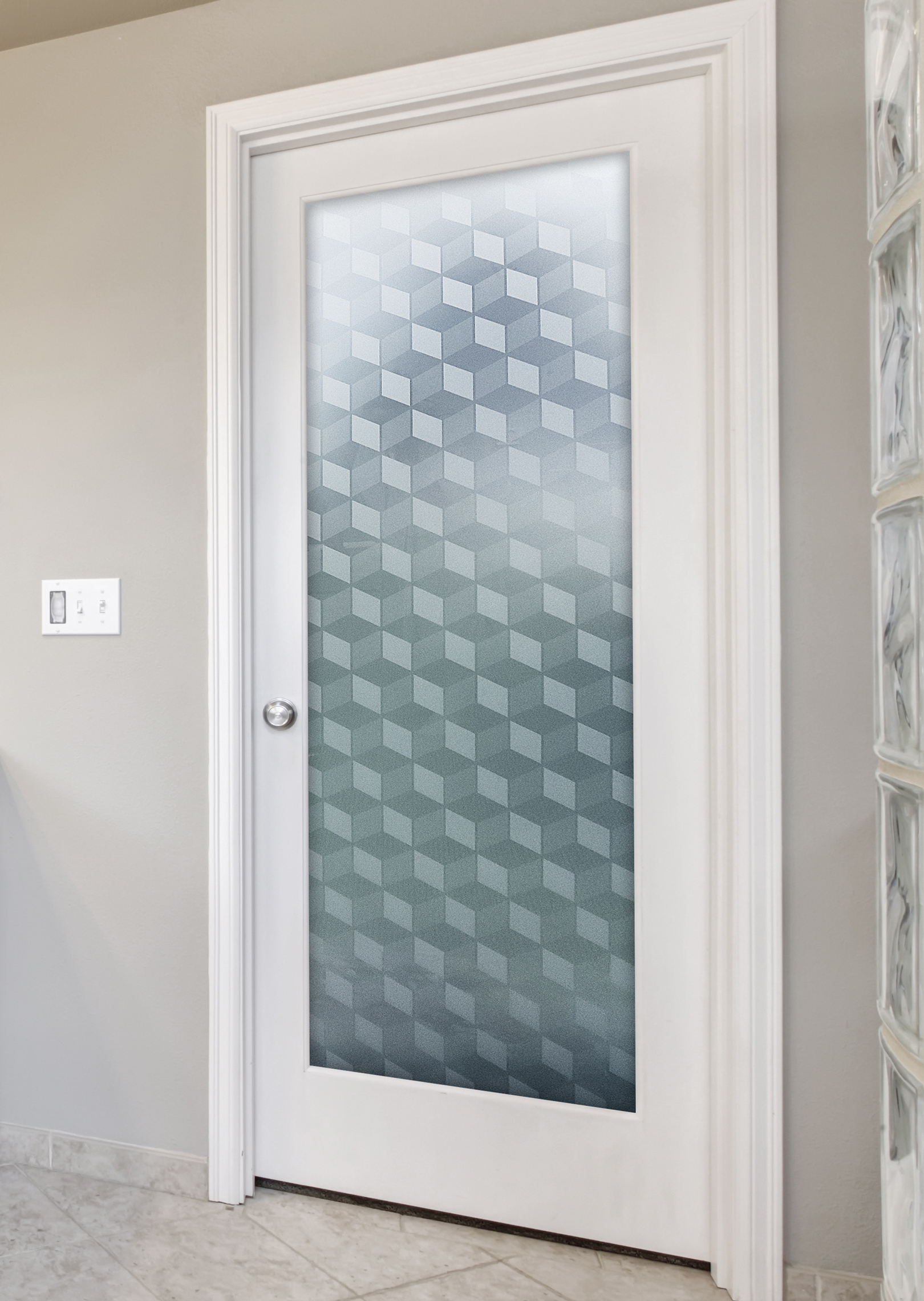 Custom tempered frosted glass pantry door with etched artistic design for long-lasting durability.