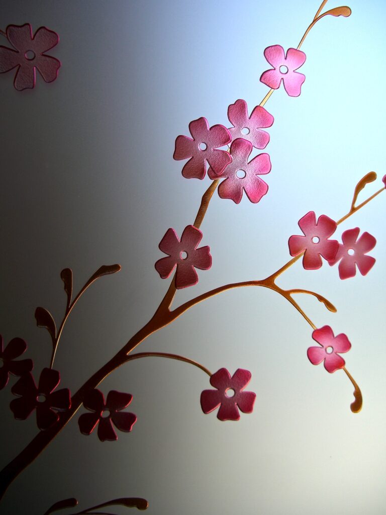 Detailed look at hand-painted Delicate Cherry Blossom glass design with soft frosted background, an elegant option for a black front door with glass panels that adds color and refinement.