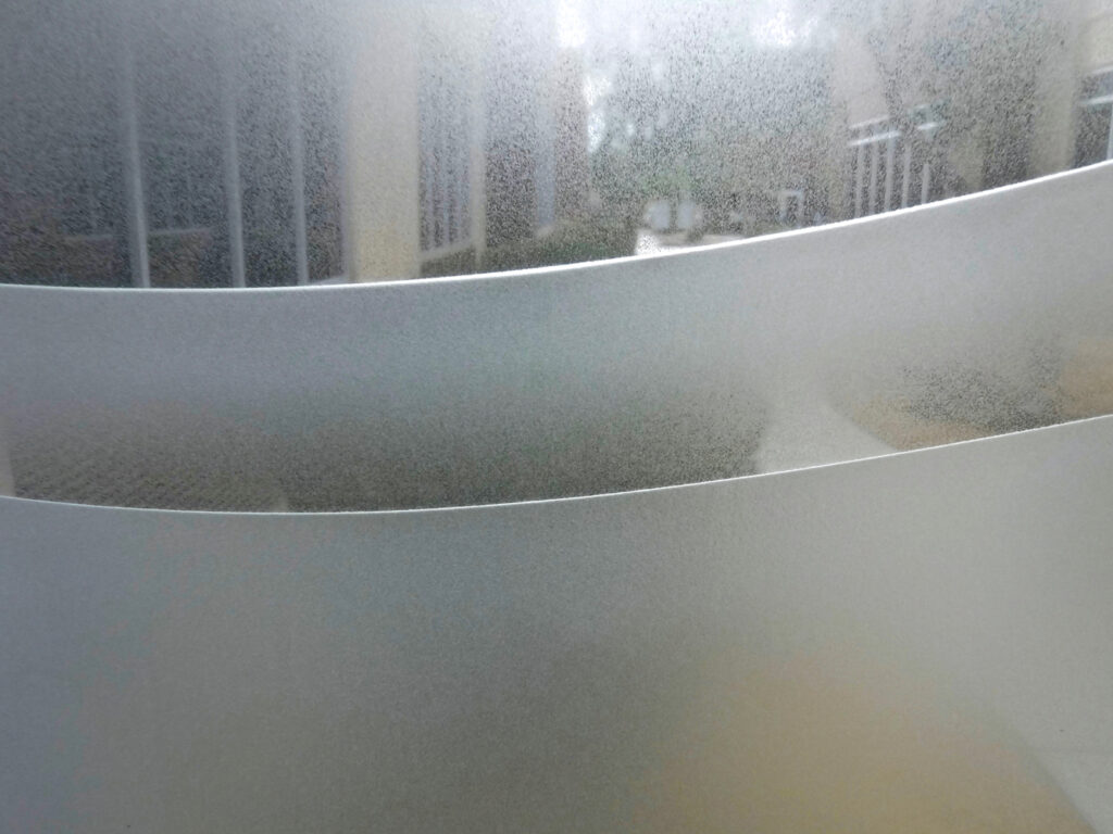 Close-up detail of dreamy waves glass panel design