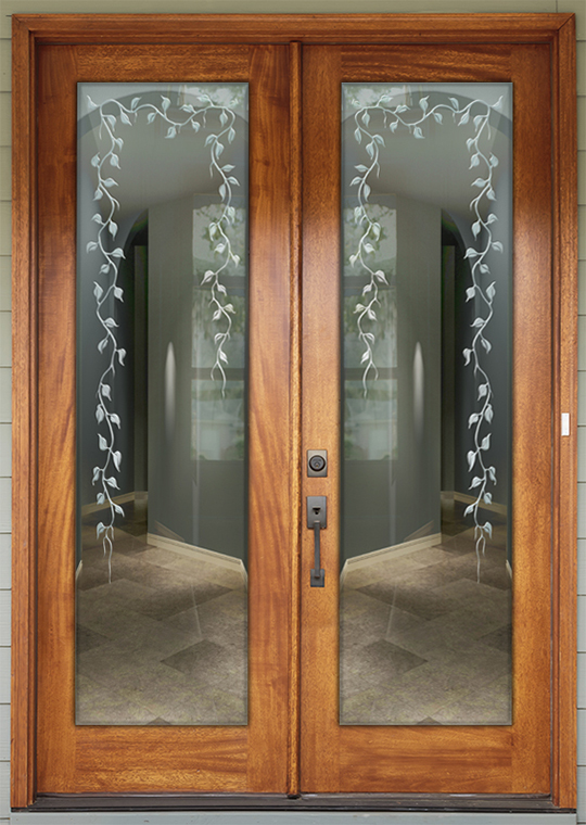 Southwest ad mediterranean glass doors with design featuring 3D carved vines art work.