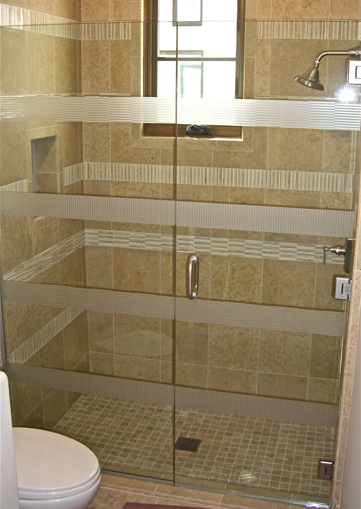 The timeless design of Horizontal Bands frosted shower door glass.
